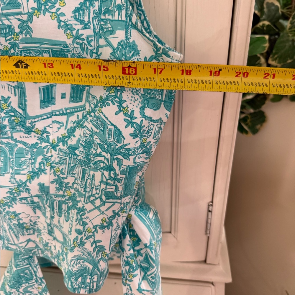 VTG RARE LILLY PULITZER WRAP SHIRT Size 10
Worth Ave pattern like new - Picture 7 of 8